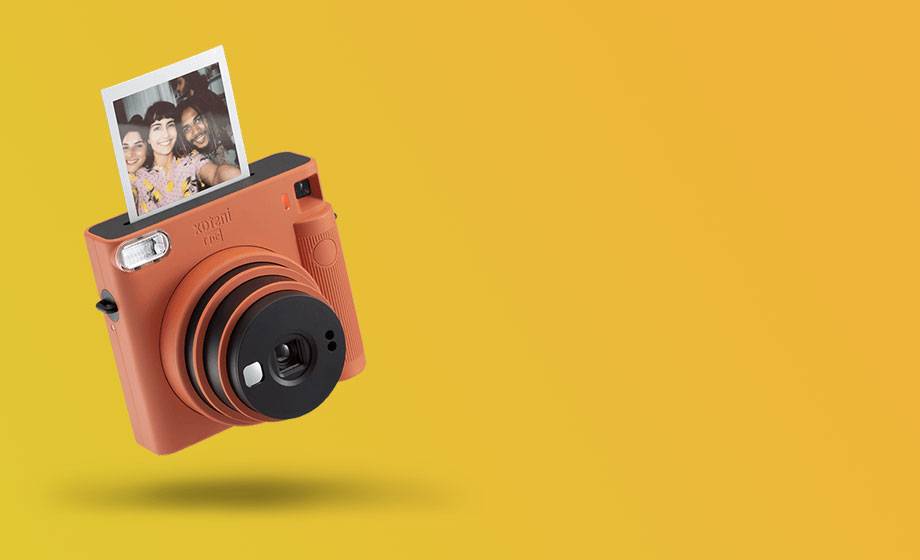 instant cameras min